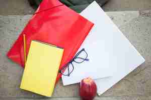 Free photo student supplies on stair step