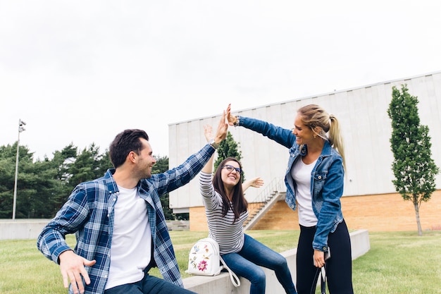 Students giving high five