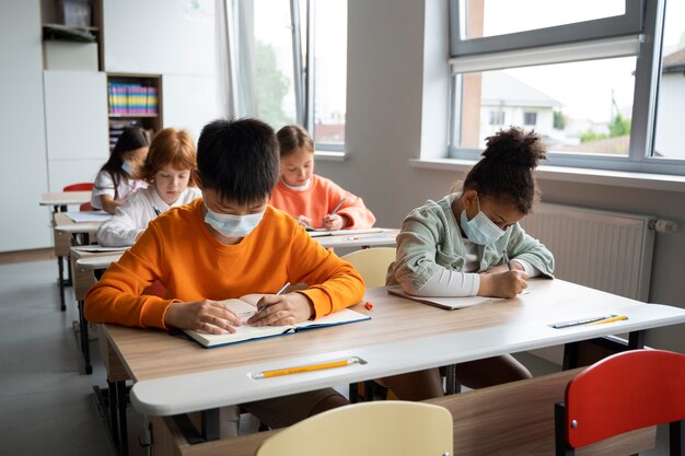 Students learning at school in their classroom