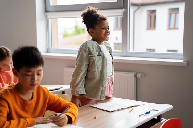 Students learning at school in their classroom