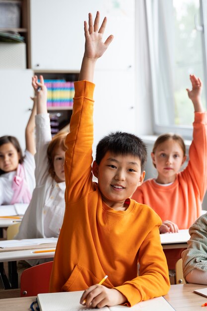 Students learning at school in their classroom