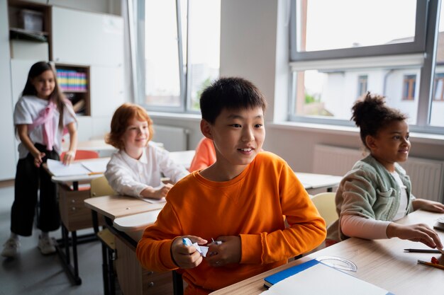 Students learning at school in their classroom