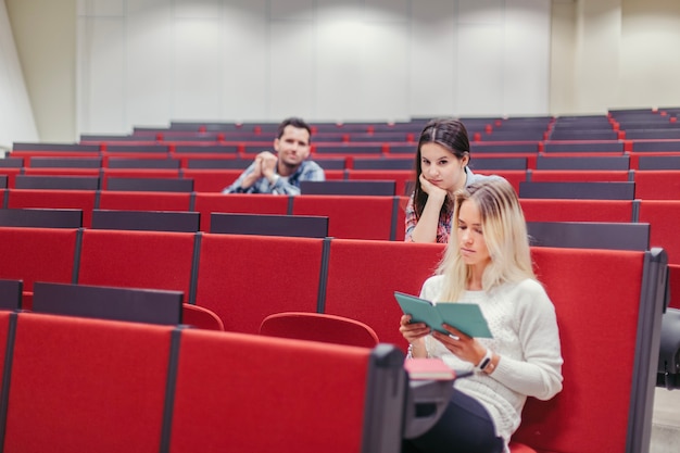 Students sitting at lecture hall 