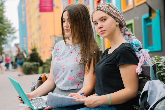 Free Photo students studying at street