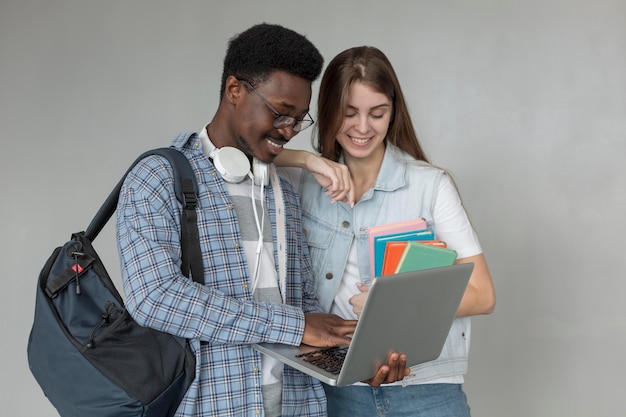 Students with laptop medium shot