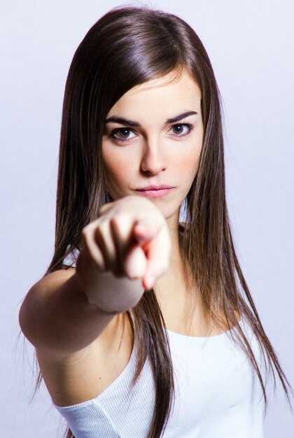 Studio Portrait of beautiful young woman posing