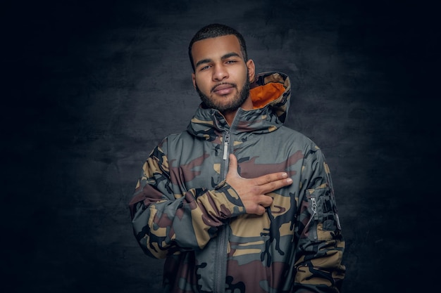 Free photo studio portrait of black man dressed in military jacket.