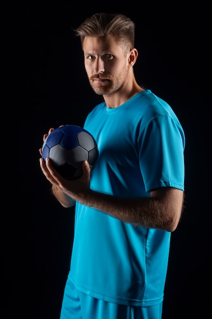 Free photo studio portrait  of handball player