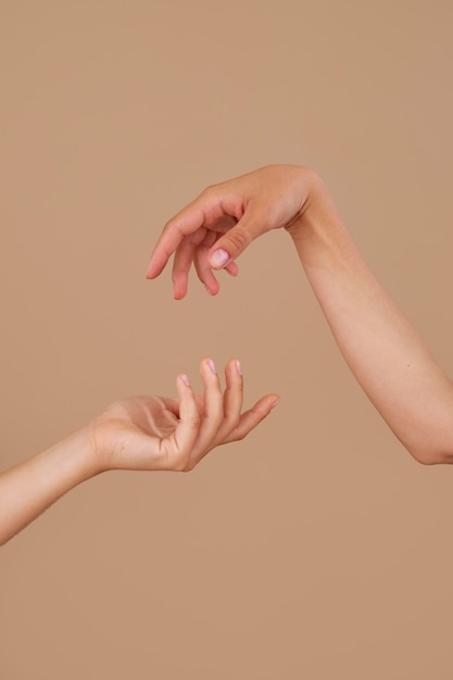 Free Photo studio portrait with people moving hands