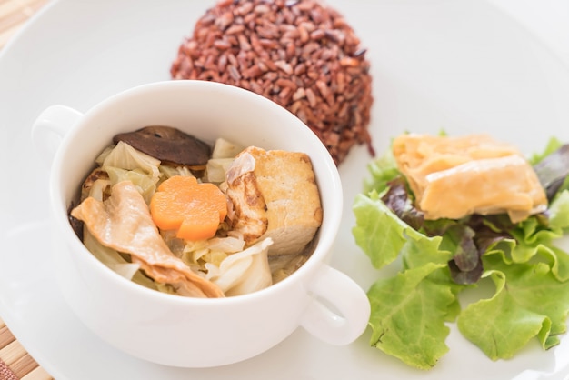 Stuffed cabbage soup with berry rice and tofu