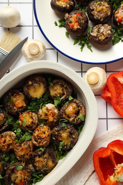 Free Photo stuffed mushrooms and vegetables on light background top view