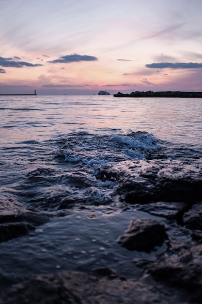 stunning sea under a pink sky