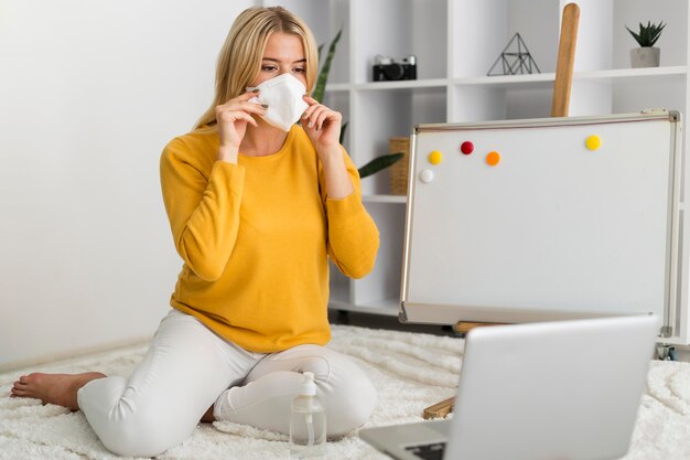 Stylish adult woman wearing face mask