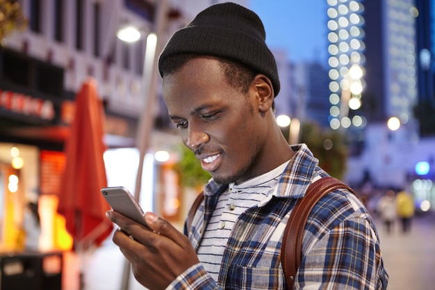 Stylish African-American man on street