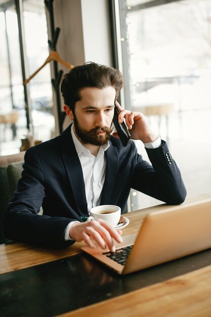 Stylish businessman working in a office