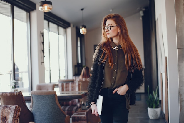 Stylish businesswoman in a cafe