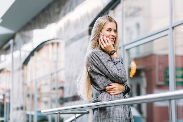 Stylish businesswoman making phone call