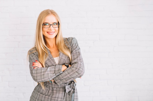 Stylish businesswoman with arms crossed