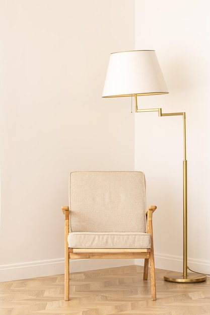 Free photo stylish floor lamp with a chair in the interior interior and style concept