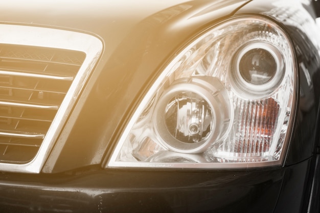 Free photo stylish headlight of dark automobile