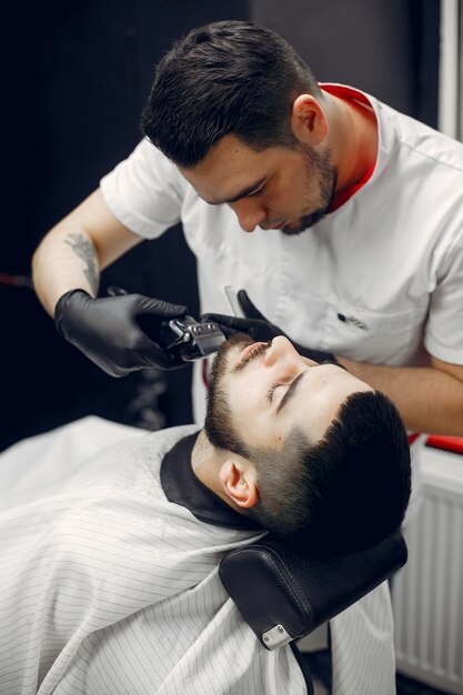 Stylish man sitting in a barbershop