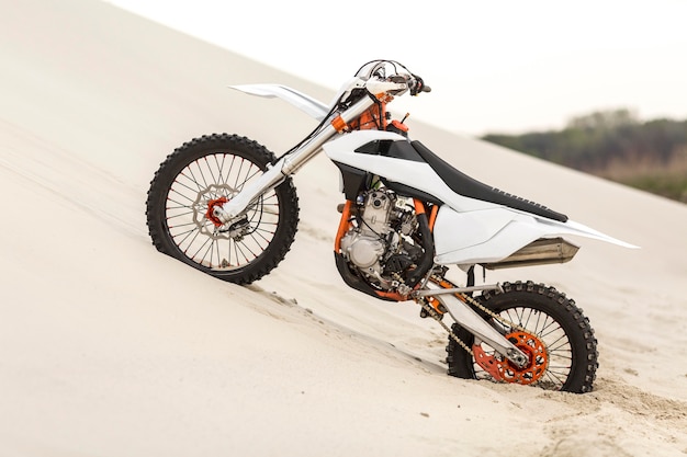 Stylish motorbike parked in the desert