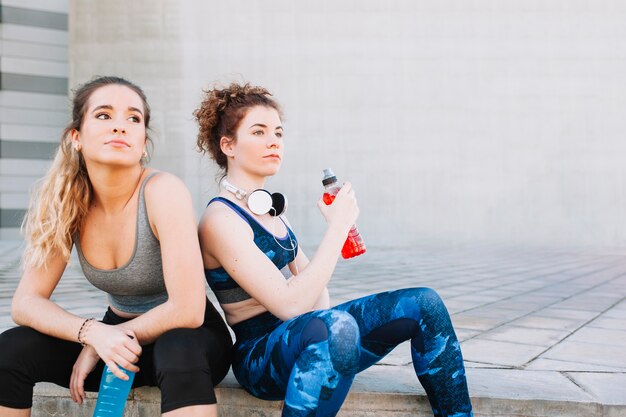 Stylish sportive girls on street