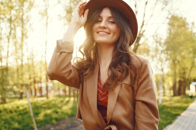 Stylish woman spending time in a spring park