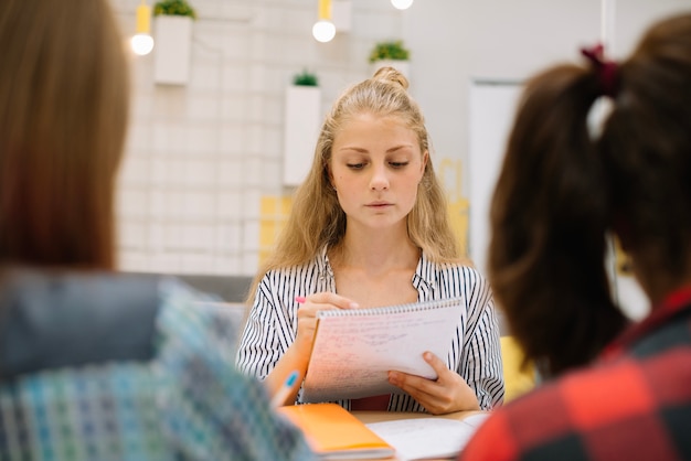 Free Photo stylish woman studying at table