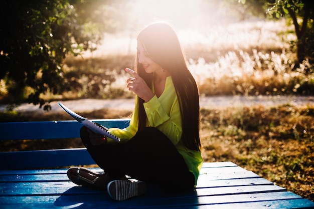 Free photo stylish woman with papers