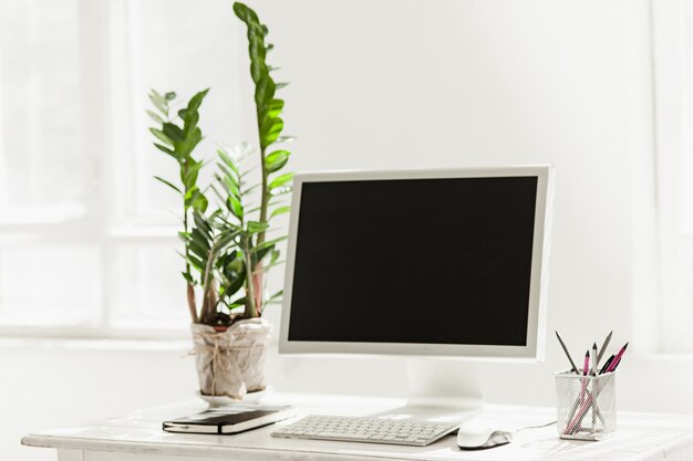 Stylish workspace with computer on home 