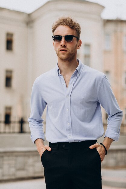 Stylish young handsome man in classy outfit