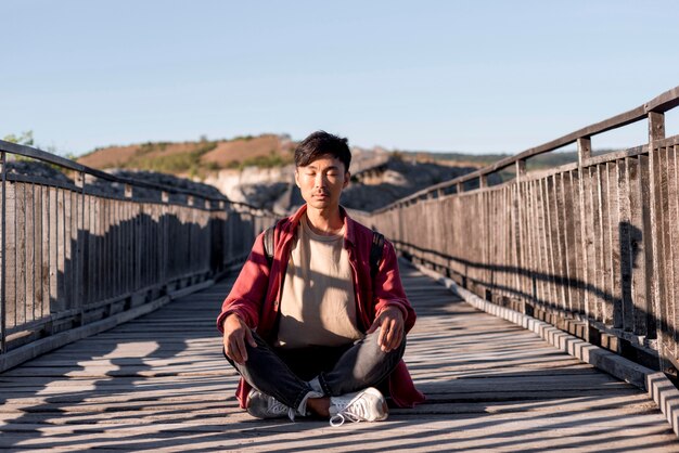 Stylish young man enjoying trip