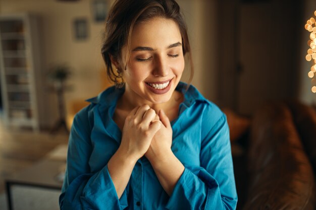 Stylish young woman with charming cute smile