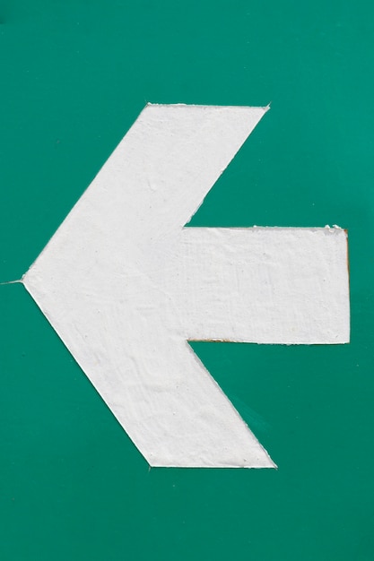 Free photo subway white arrow on green background