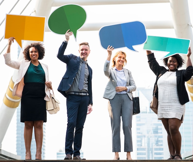 Free photo successful business people with speech bubbles