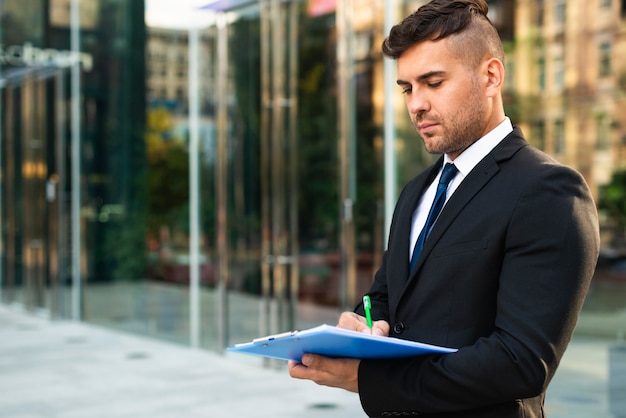 Successful business person working from outdoors