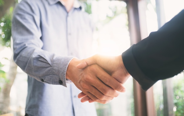 Free photo successful businessmen hand shake.