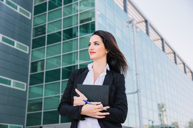 Successful businesswoman with folder