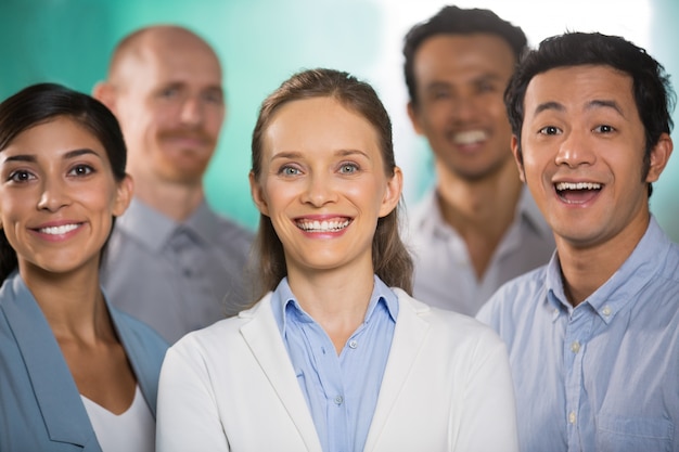 Free photo successful cheerful young diverse business people