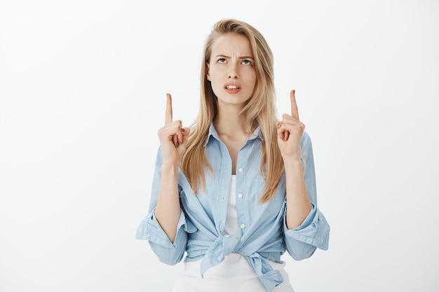 Free photo successful female entrepreneur in blue collar shirt