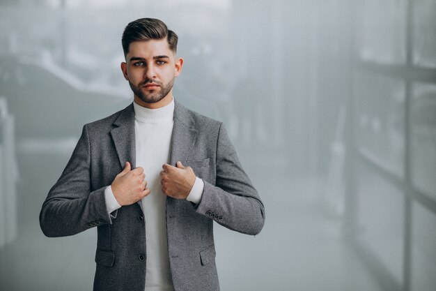 Successful handsome business man in an office