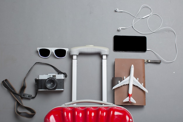 Free photo suitcase with traveler accessories