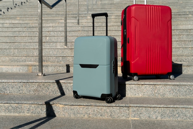 Free Photo suitcase with wheels outdoors