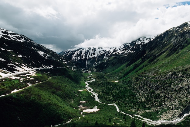 Free Photo summer alps landscape in switzerland. at the middle of swiss alps mountains