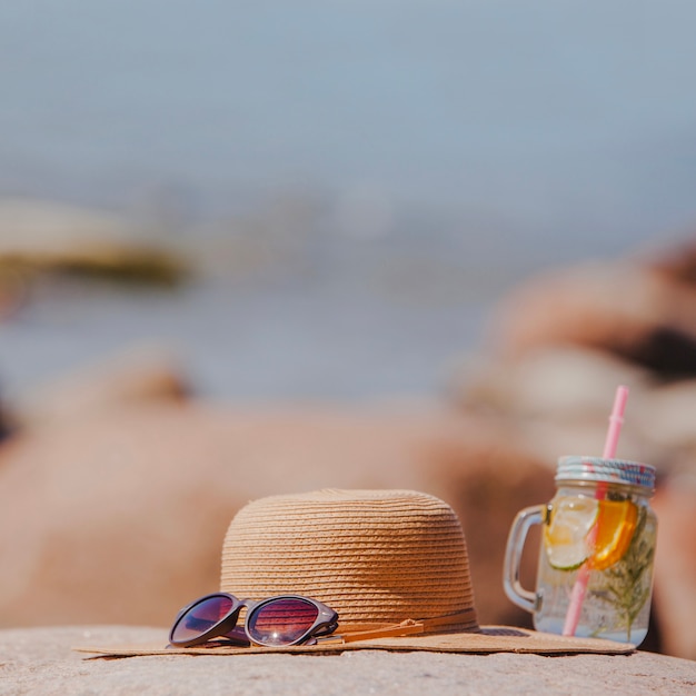 Free Photo summer composition with sunglasses and hat