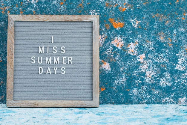 Free Photo summer related quotes on a rustic board. 