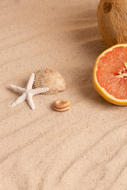 Free photo summertime vibes with coconut and grapefruit