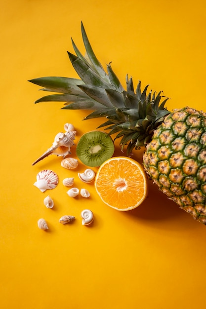 Free photo summertime vibes with pineapple fruit and shellfish