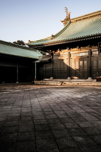 Sun hitting the traditional japanese wooden temple